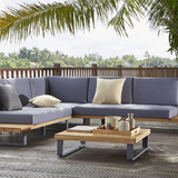 The Anitgua Corner Suite by Sunnii lifestyle combines stylish metal frames with hardwood acia to create a contemporary garden furniture suite